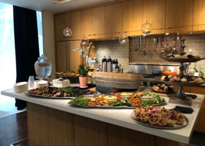 A modern kitchen with fresh food ingredients on the counter.