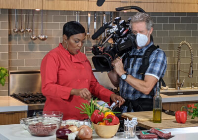 Studio kitchen set for a cooking episode with client.