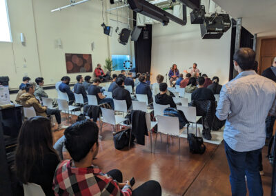 Participants seated at tables during an offsite meeting.