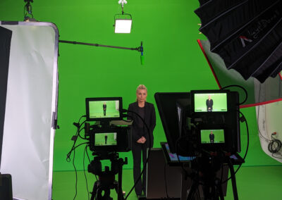 Green screen with dynamic lighting.