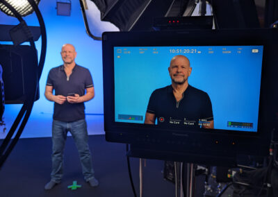 Blue LED colorwash lighting filling the studio with a cool, serene atmosphere.