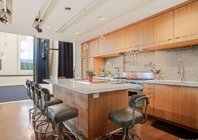 Spacious kitchen with a large island and seating.